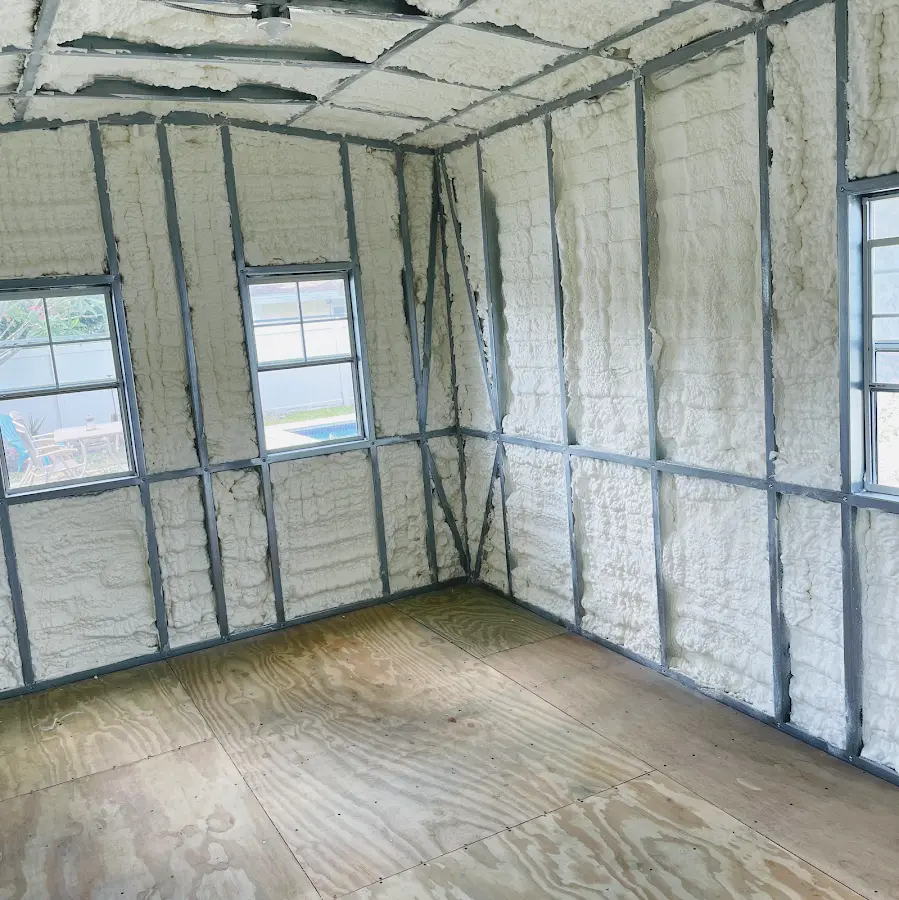 Closed-cell spray foam insulation applied to wall cavities in a residential project in Spring Hill